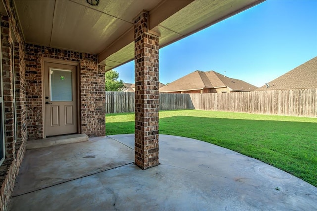 3904 Normandy Rd, Edmond, OK 73013 - fenced backyard with a patio area