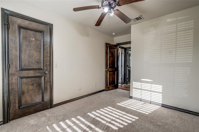 3904 Normandy Rd, Edmond, OK 73013 - unfurnished bedroom with light colored carpet and ceiling fan