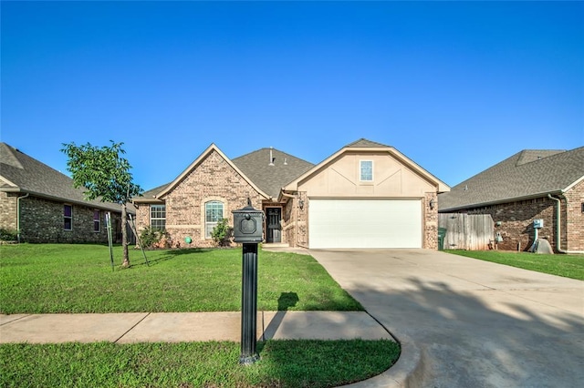 3904 Normandy Rd, Edmond, OK 73013 - view of front of house featuring a garage, concrete driveway, brick siding, a front lawn, and a shingled roof