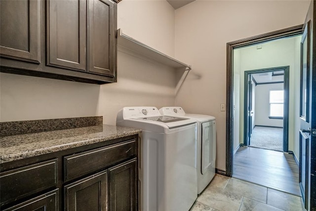 3904 Normandy Rd, Edmond, OK 73013 - laundry room featuring washer and dryer and cabinet space