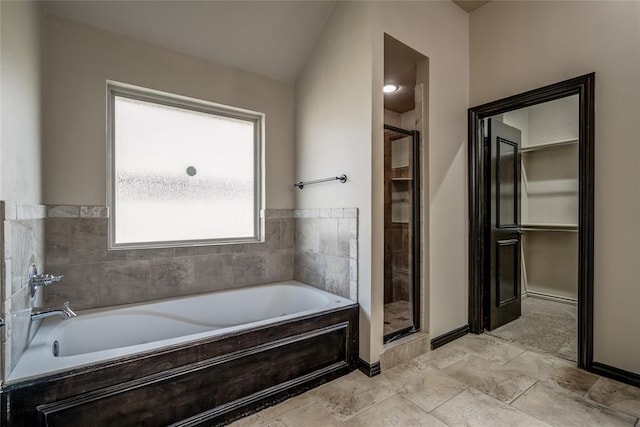 3904 Normandy Rd, Edmond, OK 73013 - full bathroom featuring a shower stall and a garden tub