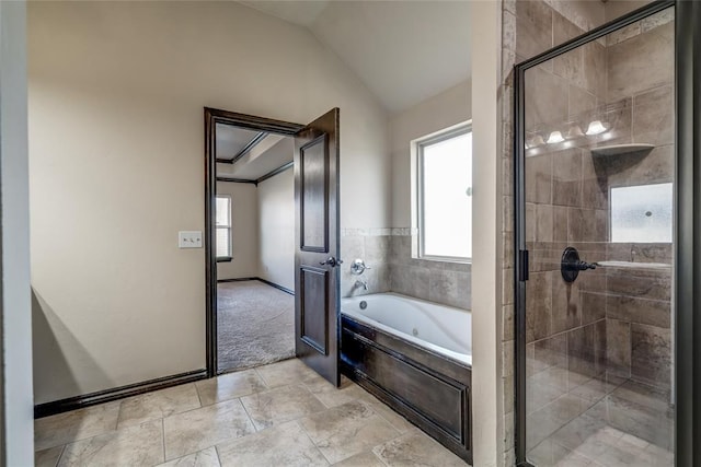 3904 Normandy Rd, Edmond, OK 73013 - bathroom with a garden tub, plenty of natural light, a stall shower, and lofted ceiling