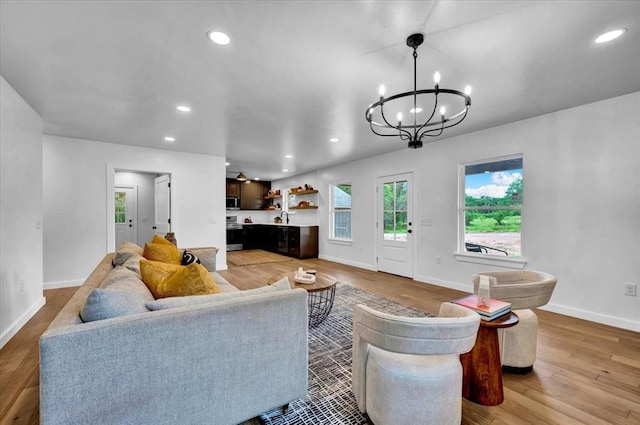 14500 Williams Way, Luther, OK 73054 - living area featuring a chandelier, light wood-type flooring, and recessed lighting