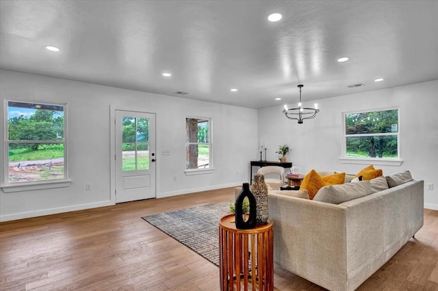 14500 Williams Way, Luther, OK 73054 - living room with recessed lighting, wood finished floors, and a chandelier