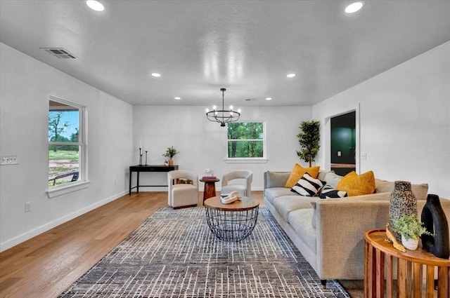 14500 Williams Way, Luther, OK 73054 - living area with wood finished floors, recessed lighting, and a chandelier
