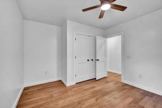 14500 Williams Way, Luther, OK 73054 - unfurnished bedroom with light wood-style floors, a closet, and a ceiling fan