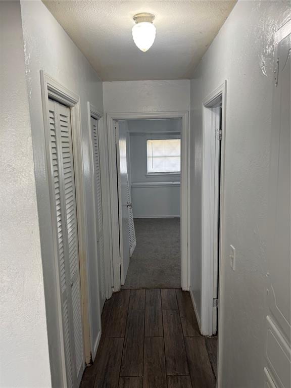 833 S Scott St, Del City, OK 73115 - corridor featuring dark wood finished floors