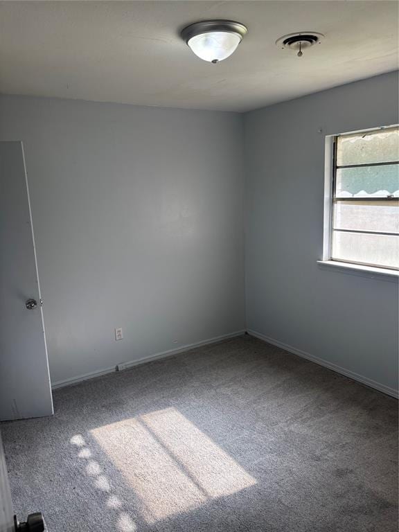 833 S Scott St, Del City, OK 73115 - unfurnished room featuring carpet flooring and baseboards