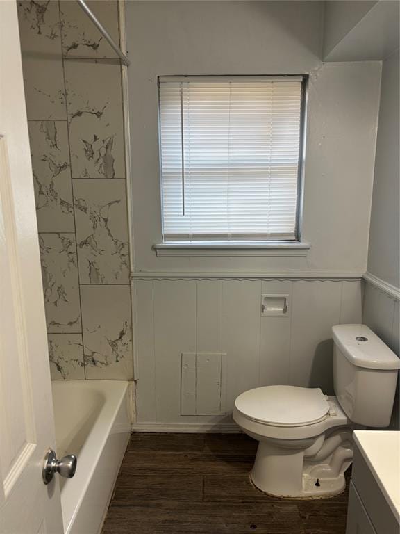 833 S Scott St, Del City, OK 73115 - full bath with vanity, wood finished floors, a decorative wall, and wainscoting