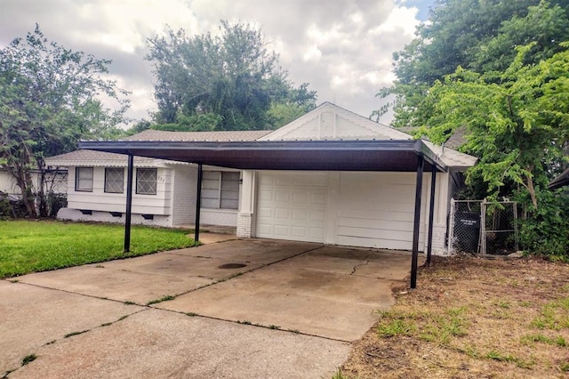 833 S Scott St, Del City, OK 73115 - ranch-style home featuring an attached garage and concrete driveway