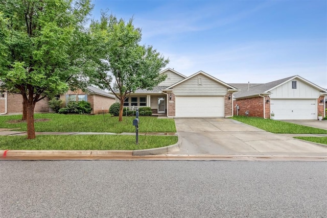 2718 Sharpish Way, Norman, OK 73069 - view of front of house with brick siding, a front yard, an attached garage, and driveway