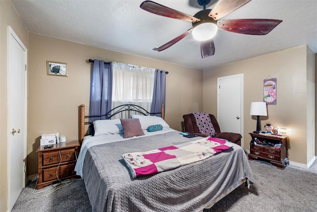 3409 S 4th St, Chickasha, OK 73018 - bedroom with carpet floors, ceiling fan, and a textured ceiling