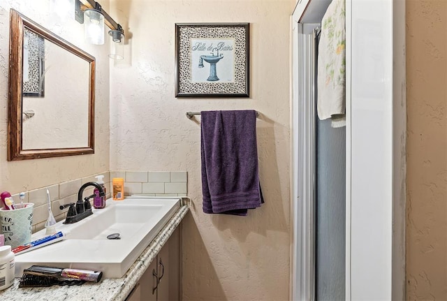 3409 S 4th St, Chickasha, OK 73018 - bathroom with a textured wall and vanity