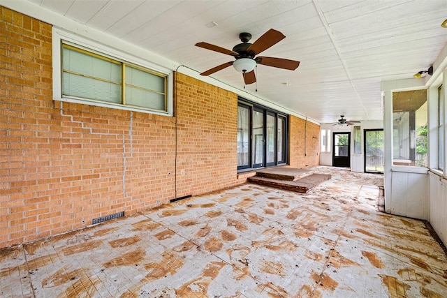 3409 S 4th St, Chickasha, OK 73018 - unfurnished sunroom featuring a ceiling fan