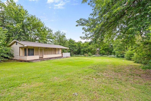 3409 S 4th St, Chickasha, OK 73018 - view of green lawn with covered porch