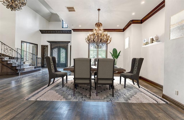 6516 NW Grand Blvd, Nichols Hills, OK 73116 - dining area with a chandelier, stairway, wood finished floors, recessed lighting, and ornamental molding
