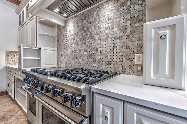 6516 NW Grand Blvd, Nichols Hills, OK 73116 - kitchen with range with two ovens, open shelves, light stone counters, glass insert cabinets, and white cabinets