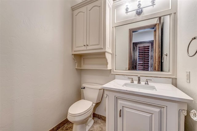 6516 NW Grand Blvd, Nichols Hills, OK 73116 - bathroom with vanity and a textured wall