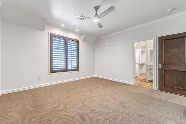 6516 NW Grand Blvd, Nichols Hills, OK 73116 - unfurnished bedroom featuring ornamental molding, carpet, ceiling fan, and a spacious closet