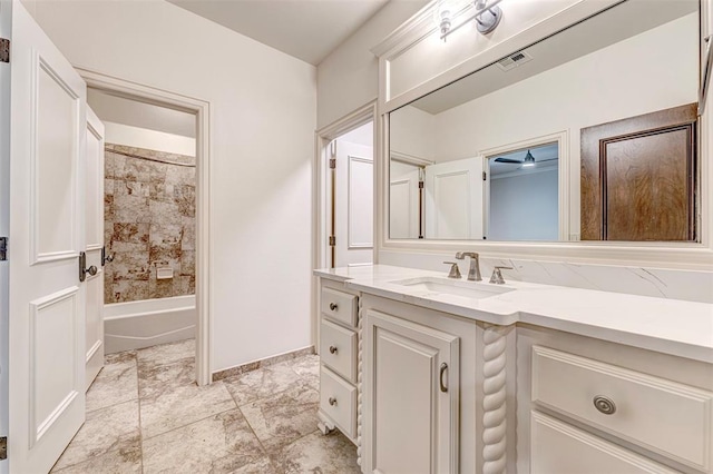 6516 NW Grand Blvd, Nichols Hills, OK 73116 - bathroom with vanity and washtub / shower combination