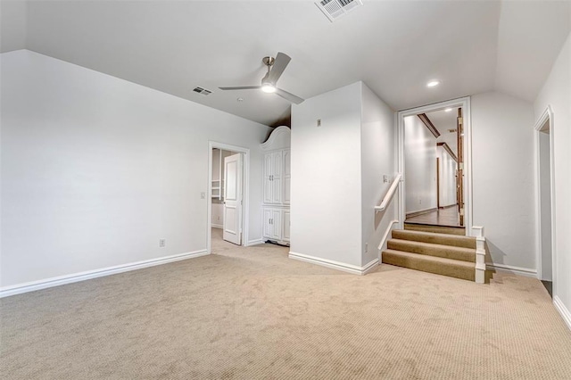 6516 NW Grand Blvd, Nichols Hills, OK 73116 - basement with light colored carpet, a ceiling fan, and stairway