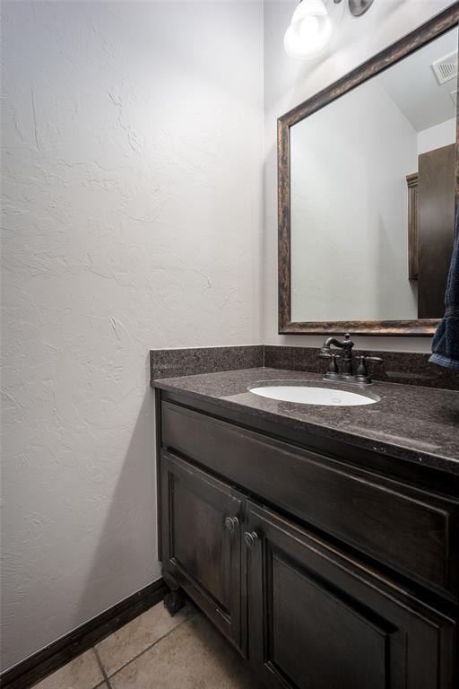 16312 Old Elm Ln, Edmond, OK 73013 - bathroom featuring vanity and tile patterned floors