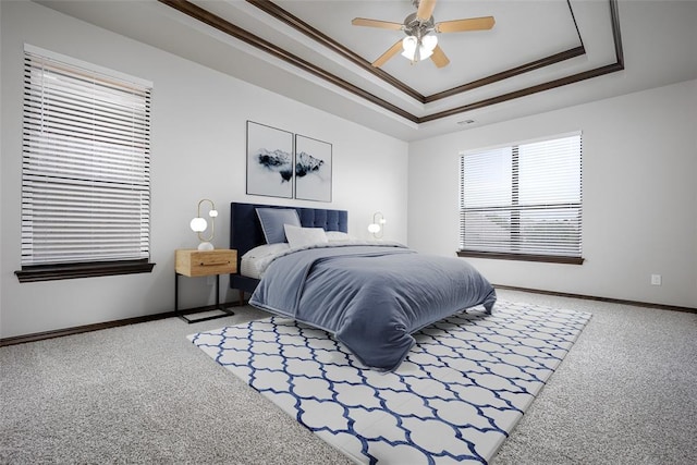 16312 Old Elm Ln, Edmond, OK 73013 - bedroom with carpet flooring, a raised ceiling, crown molding, and ceiling fan