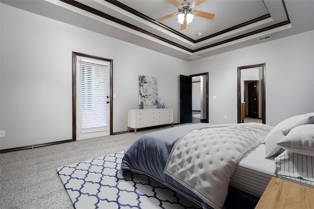16312 Old Elm Ln, Edmond, OK 73013 - carpeted bedroom featuring a raised ceiling