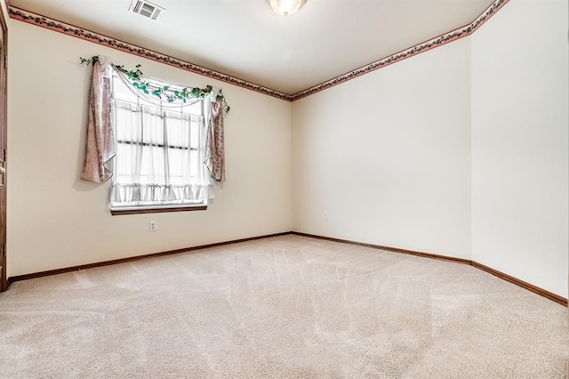 11129 Springhollow Ct, Oklahoma City, OK 73120 - carpeted spare room featuring baseboards