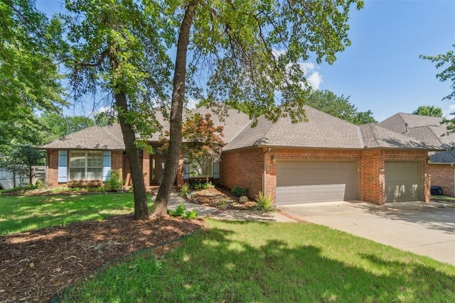 108 N Bradbury Dr, Edmond, OK 73034 - view of front facade with a garage, brick siding, a front lawn, concrete driveway, and a shingled roof