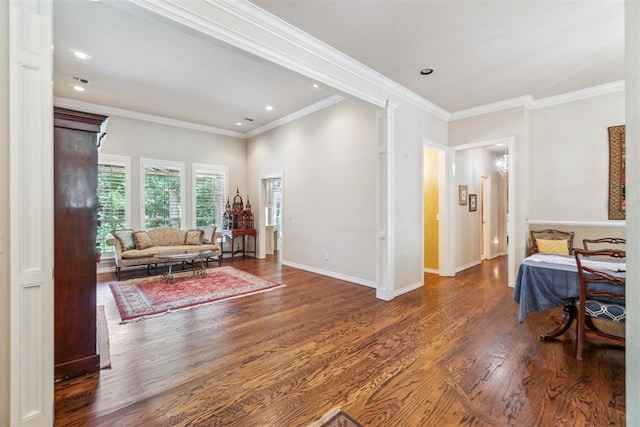 108 N Bradbury Dr, Edmond, OK 73034 - living area with wood finished floors, recessed lighting, and ornamental molding