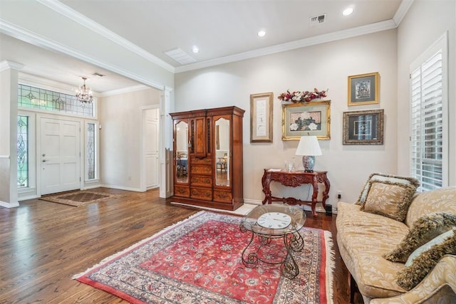 108 N Bradbury Dr, Edmond, OK 73034 - entryway with wood finished floors, a chandelier, decorative columns, recessed lighting, and crown molding