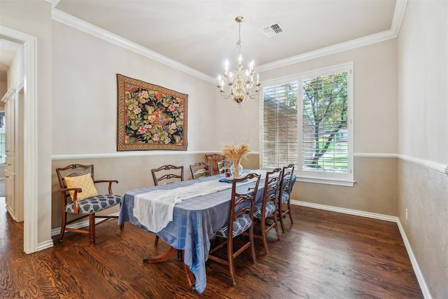 108 N Bradbury Dr, Edmond, OK 73034 - dining space with wood finished floors, a chandelier, and ornamental molding
