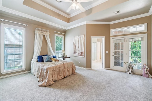 108 N Bradbury Dr, Edmond, OK 73034 - bedroom with carpet, ornamental molding, a raised ceiling, a ceiling fan, and access to exterior