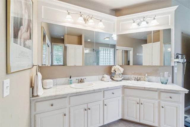 108 N Bradbury Dr, Edmond, OK 73034 - bathroom with double vanity and an enclosed shower