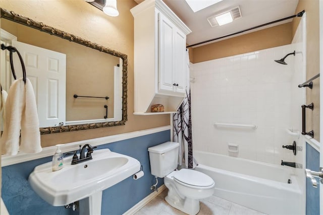 108 N Bradbury Dr, Edmond, OK 73034 - bathroom featuring shower / bath combo and tile patterned flooring