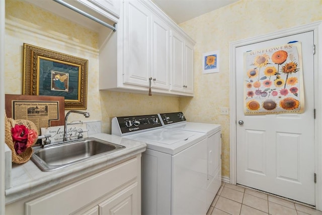 108 N Bradbury Dr, Edmond, OK 73034 - washroom with washer and dryer, cabinet space, and light tile patterned flooring
