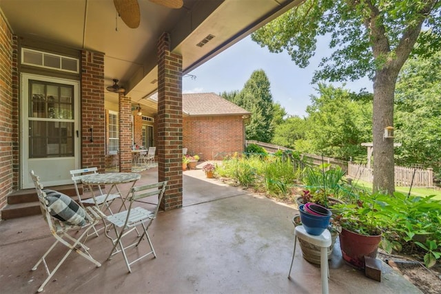 108 N Bradbury Dr, Edmond, OK 73034 - view of patio featuring ceiling fan