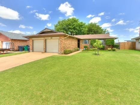 1329 SW 77th Ter, Oklahoma City, OK 73159 - ranch-style house with an attached garage, concrete driveway, and brick siding