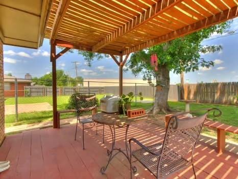 1329 SW 77th Ter, Oklahoma City, OK 73159 - view of patio / terrace featuring a pergola
