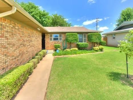 1329 SW 77th Ter, Oklahoma City, OK 73159 - view of grassy yard