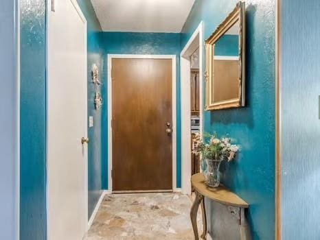 1329 SW 77th Ter, Oklahoma City, OK 73159 - doorway with baseboards
