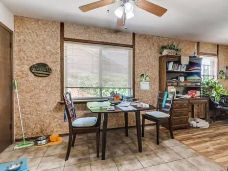 1329 SW 77th Ter, Oklahoma City, OK 73159 - dining room featuring a ceiling fan and light tile patterned floors
