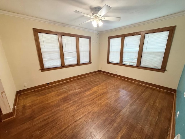722 E Main St, Sentinel, OK 73664 - spare room featuring wood finished floors, ceiling fan, and crown molding