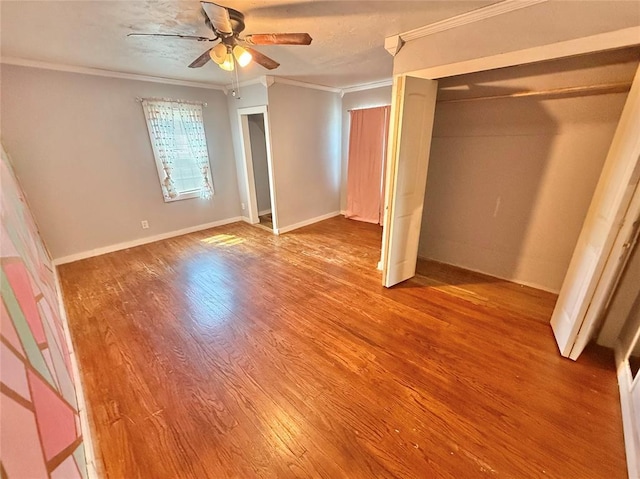 722 E Main St, Sentinel, OK 73664 - unfurnished bedroom with ornamental molding, light wood finished floors, and a ceiling fan