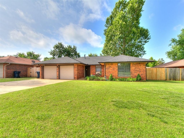 2228 Butternut Pl, Edmond, OK 73013 - single story home with a garage, driveway, and brick siding