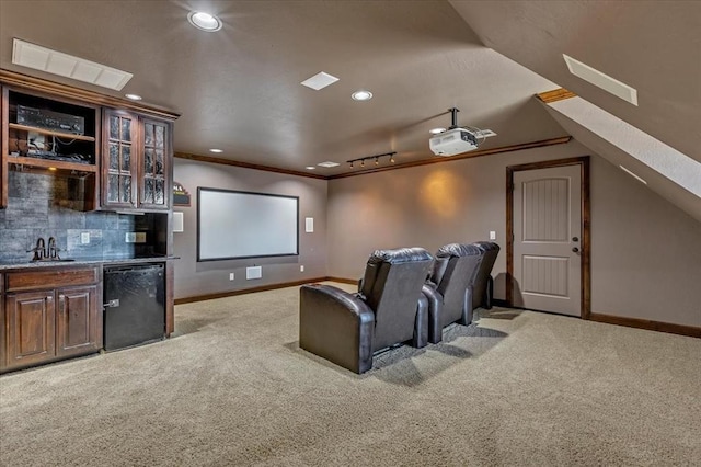 13705 Verona Strada, Oklahoma City, OK 73170 - cinema with light colored carpet, wet bar, recessed lighting, and crown molding