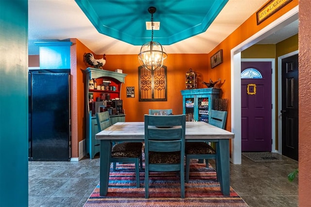 1408 Eagle Dr, Moore, OK 73160 - dining space featuring a chandelier and tile patterned flooring
