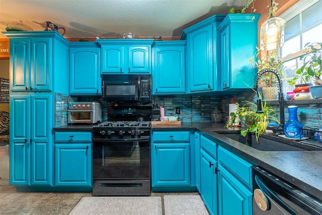1408 Eagle Dr, Moore, OK 73160 - kitchen with black appliances, tasteful backsplash, dark countertops, a textured ceiling, and blue cabinetry
