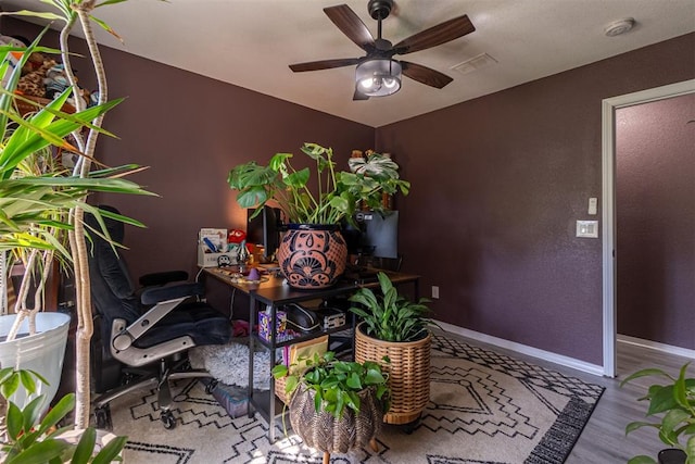 1408 Eagle Dr, Moore, OK 73160 - office area with ceiling fan and wood finished floors